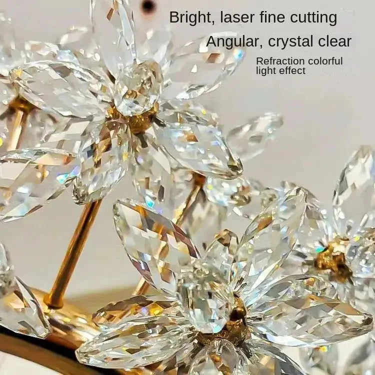 Close-up of a crystal decorative item with gold accents, highlighting its cut and clarity.