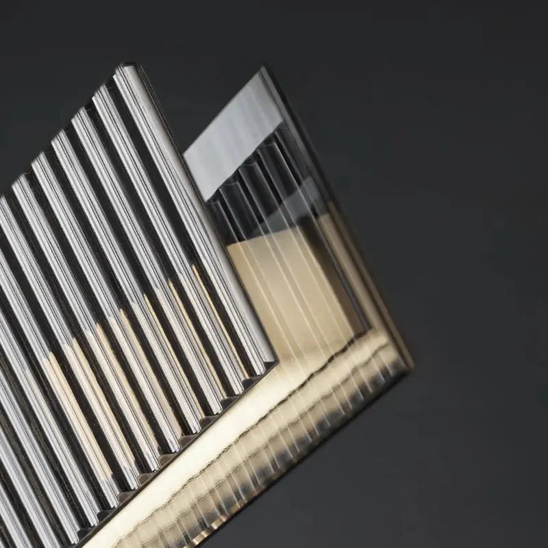 Minimalist Black Linear Chandelier Above Dining Table