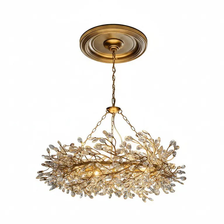 Chandelier hanging from the ceiling in a room with a mirror and door.