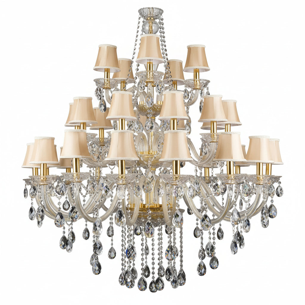 Large crystal chandelier in a room with furniture and decor.