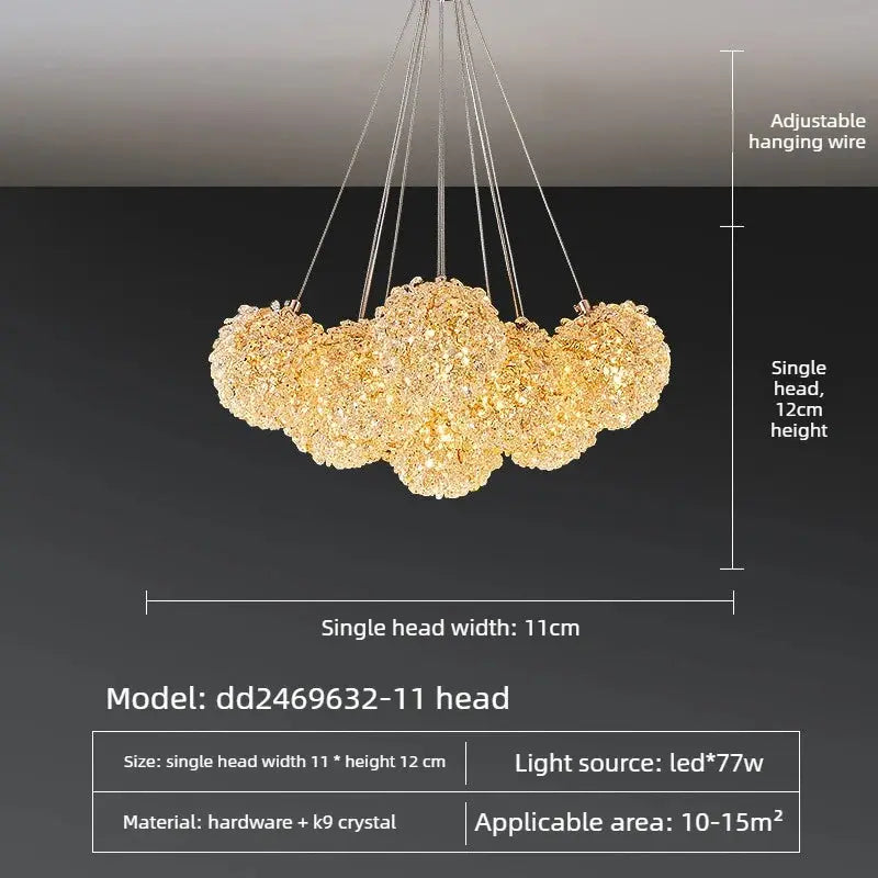 A multi-light cluster chandelier with five glowing crystal globes suspended by thin wires, shown against a dark background with overlaid dimension labels and product specs.