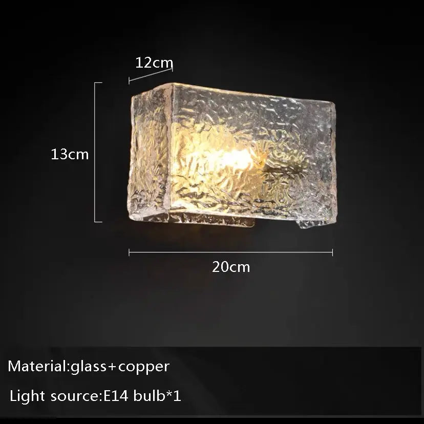 Wall-mounted light fixture with dimensions and material details on a black background