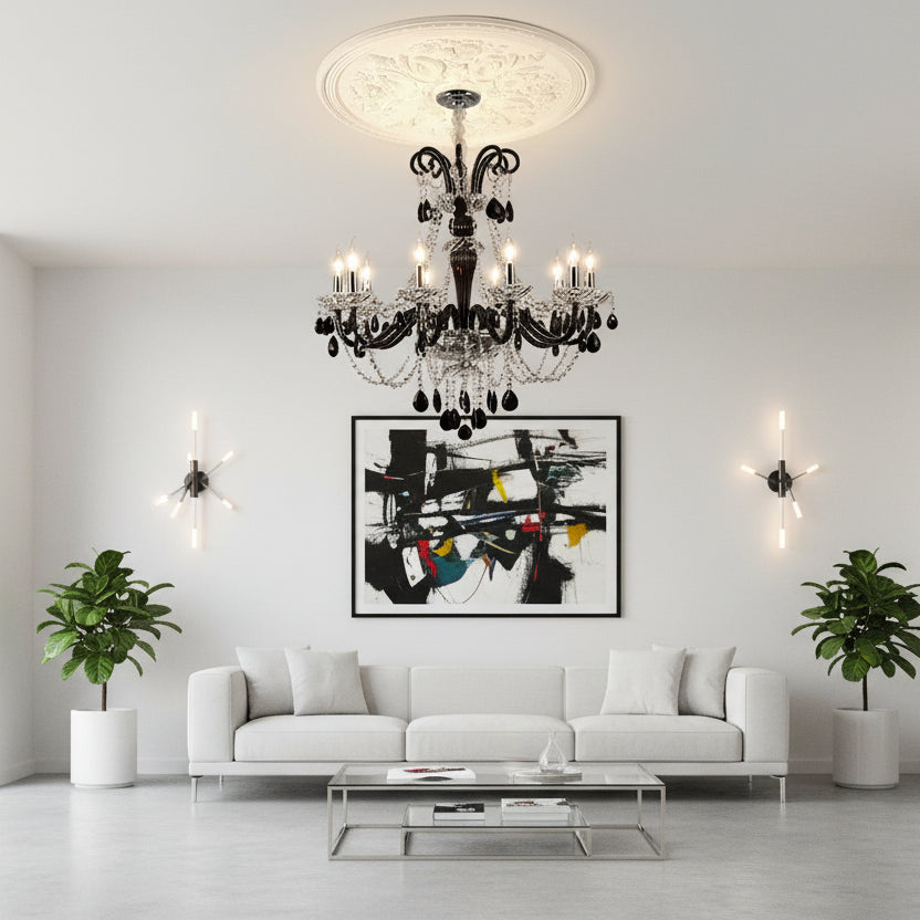Chandelier hanging in a room with framed pictures on the wall
